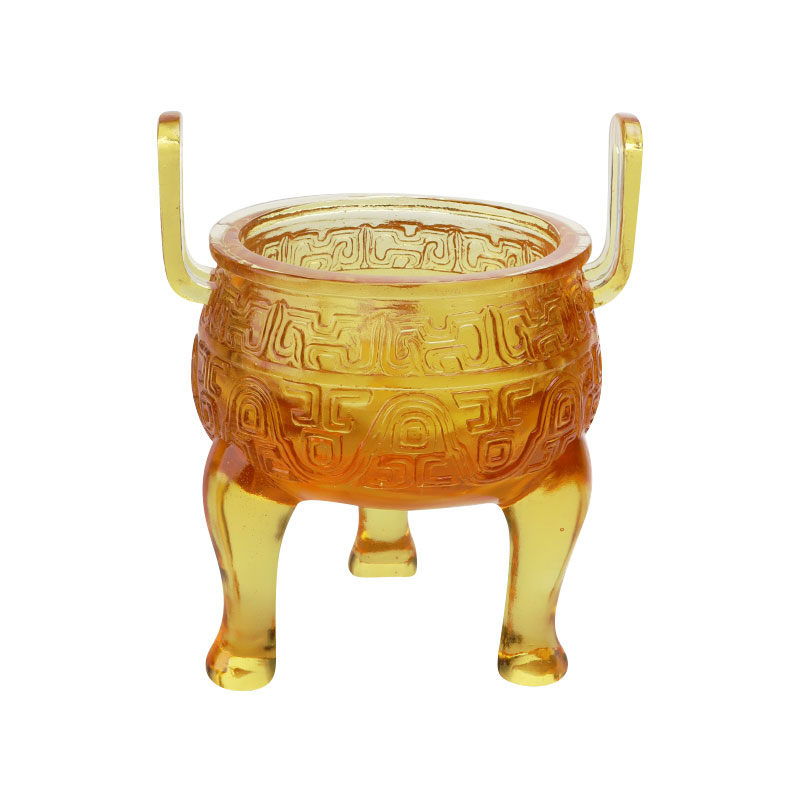 Dreibeinige Ornamente aus goldfarbener Glasur