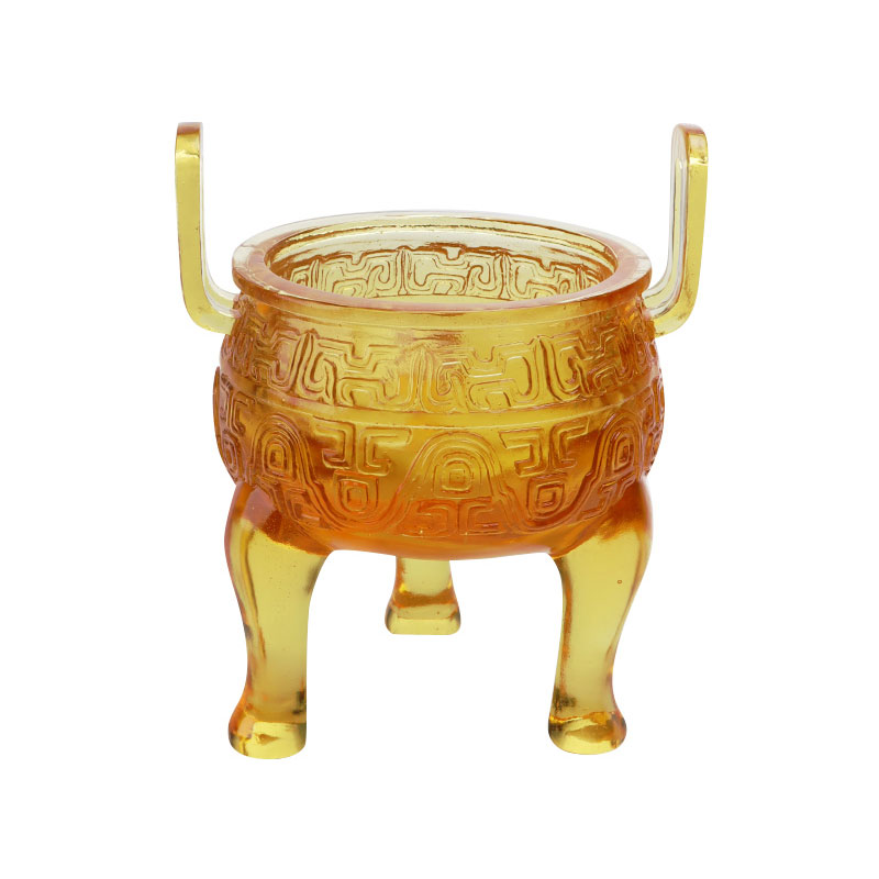 Dreibeinige Ornamente aus goldfarbener Glasur