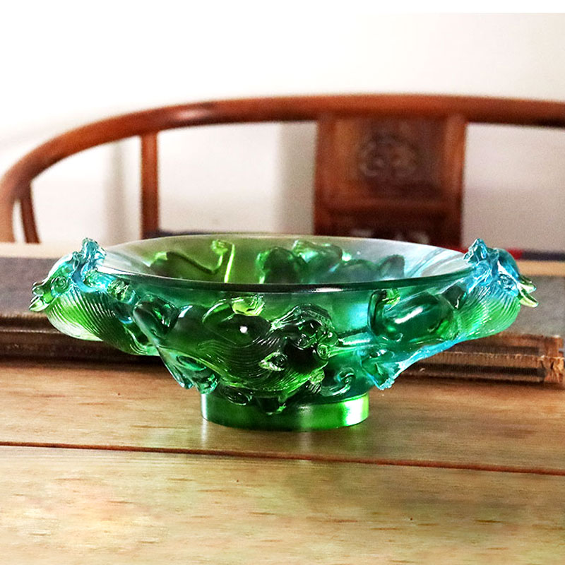 Transparenter Obstteller aus grünem Glas