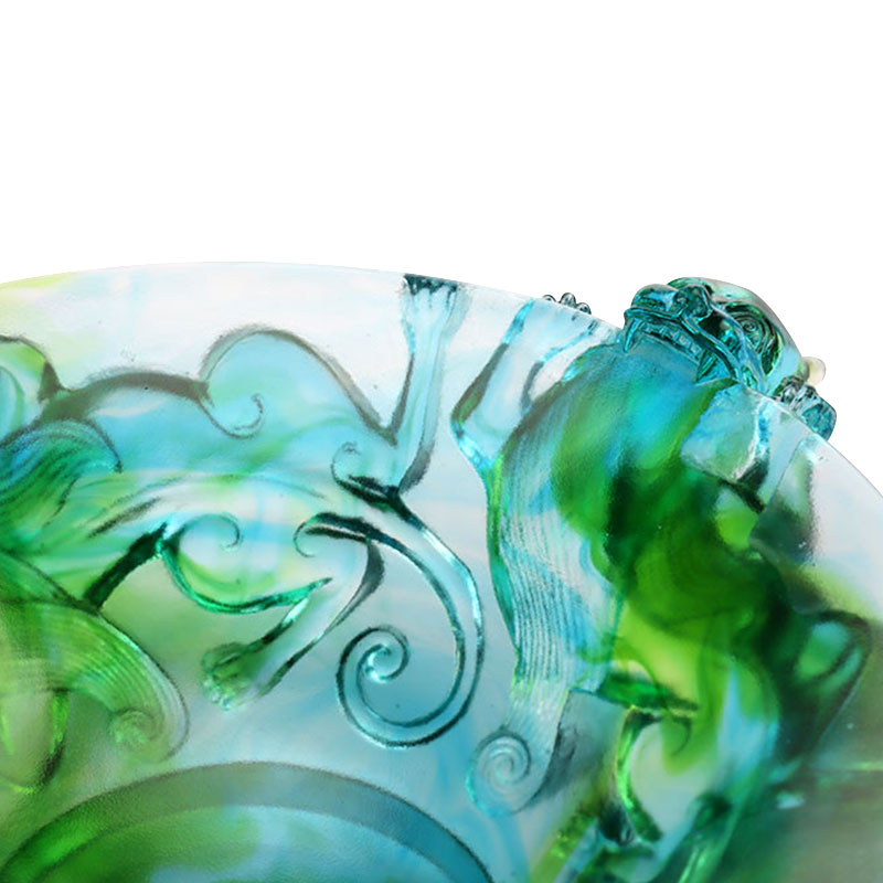 Transparenter Obstteller aus grünem Glas