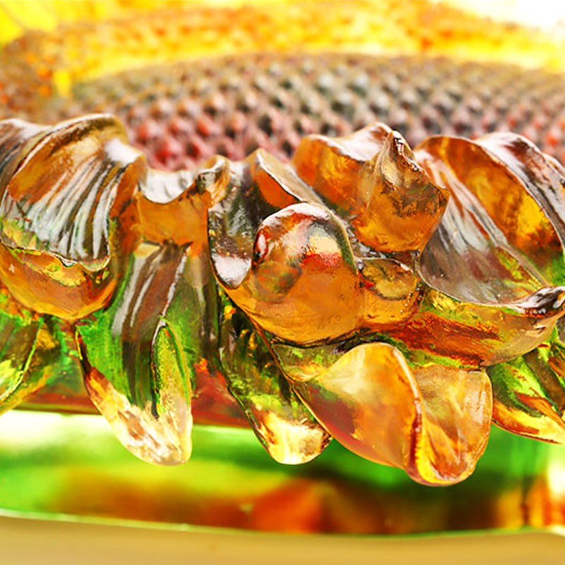 Obsttablett aus farbigem glasiertem Glas in Sonnenblumenform